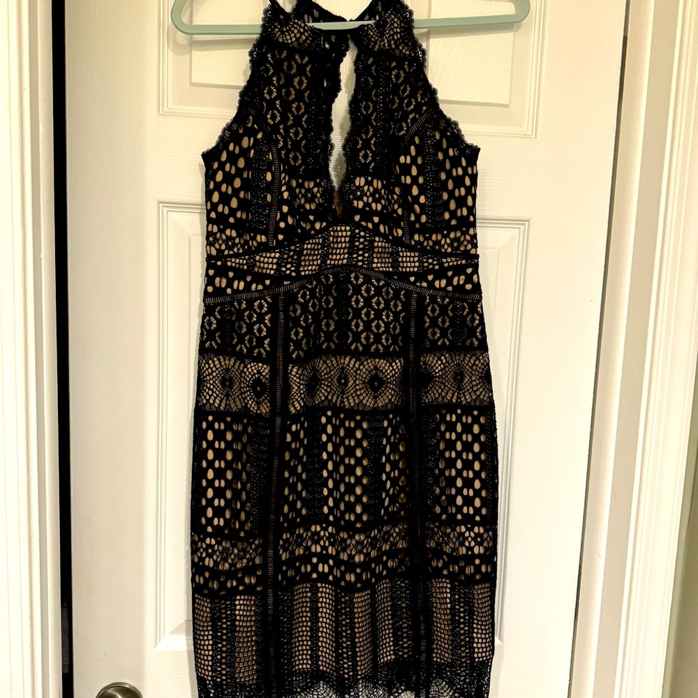 Black and nude lace cocktail dress.